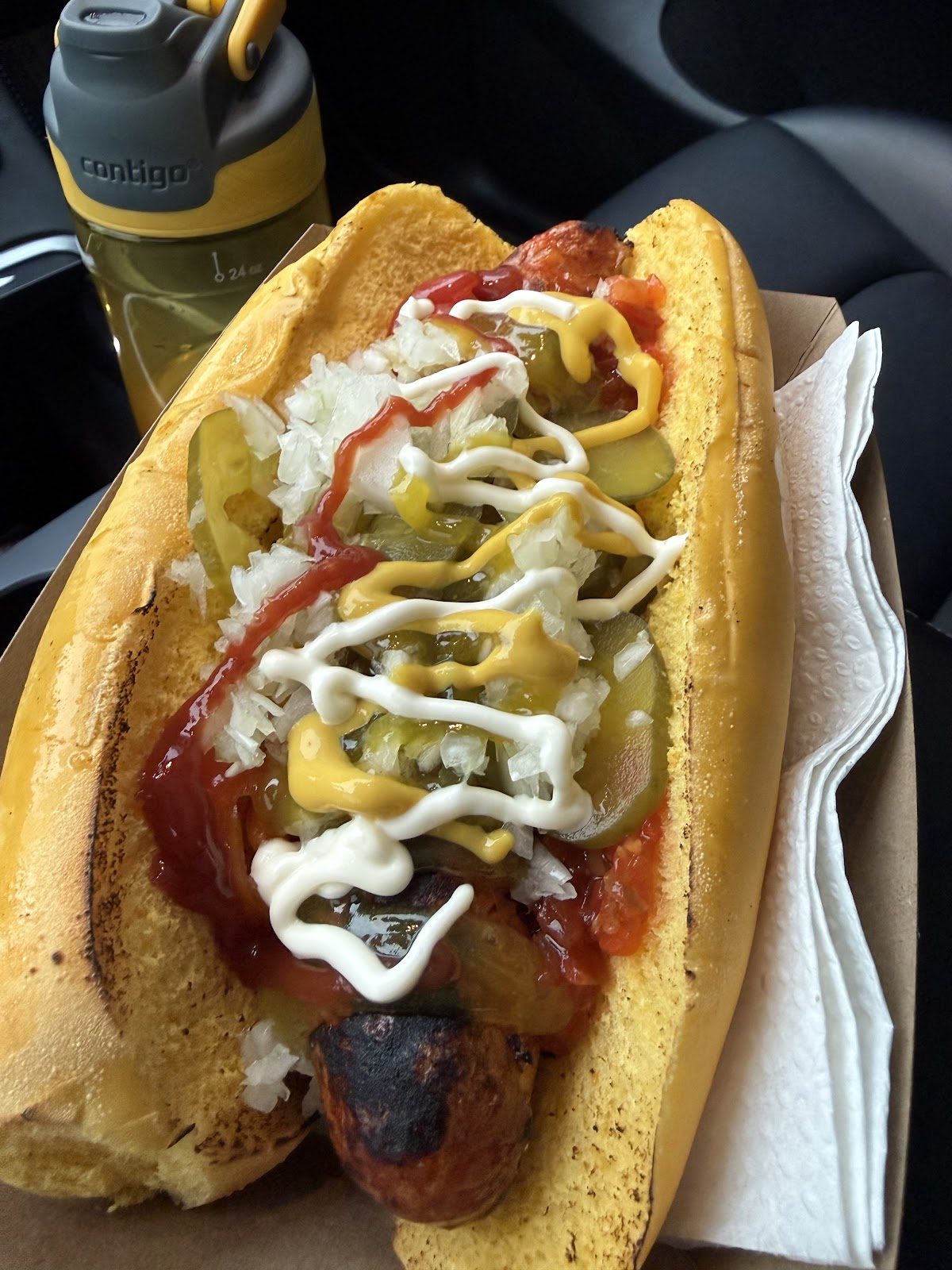 A loaded hot dog with toppings from Attwell Food